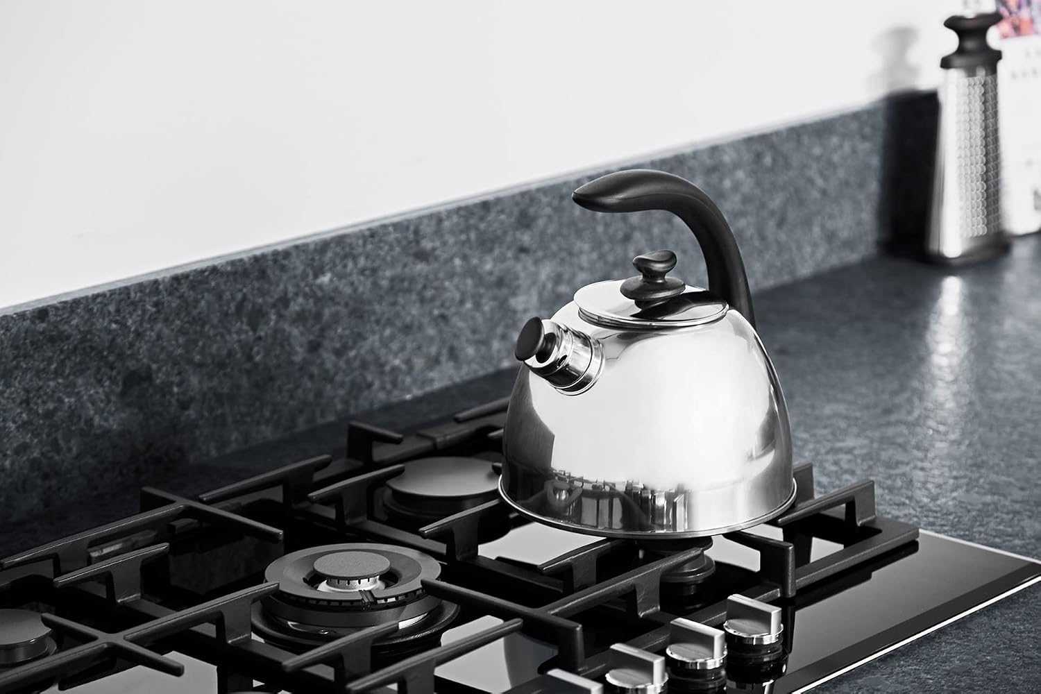 BergHOFF Essentials 18/10 Stainless Steel Whistling Kettle 2.6 qt. Silver Lucia Safe Grip Handle Simplifies filling and cleaning Induction cooktop compatible