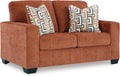 Signature Design by Ashley Aviemore Casual Loveseat with 2 Accent Pillows, Orange
